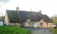 Thatched roof cottage in Saint-Eloi hamlet.