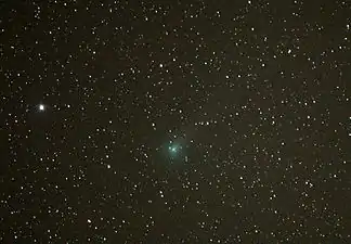 Sporting a vague tail to the 2 o'clock on 9 May 2007 from Mount Laguna. The star is Mu Draconis (mag 4.90)