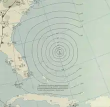 A contoured map depicting the hurricane; roughly concentric circles trace lines of like pressures, and the storm, marked with an 'L', lies at the center of these circles.