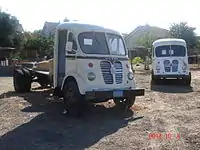 Unrestored (left) 1961 A-series Walk-in Cab truck, (right) 1957 S-series van