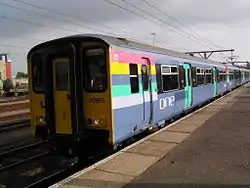 One Class 317 at Cambridge in July 2005