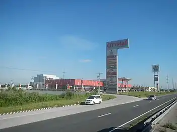 Portion of the transmission line's line 2 passing through Seaoil gas station and CityMall SCTEx in Concepcion, Tarlac.