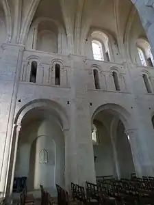 Lessay Abbey in Normandy (begun 1080), with a triforium instead of a tribune as the middle level