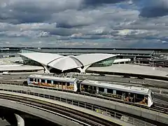 An AirTrain vehicle in front of the TWA Flight Center