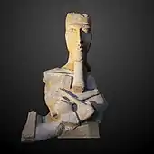 Statue of Akhenaten; c. 1350 BC; painted sandstone; 1.3 × 0.8 × 0.6 m; Louvre