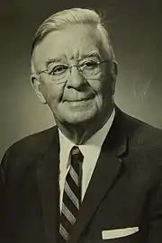 Photo of Alfred Verville in a sport coat posing for formal picture