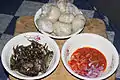 Banku with fried fish and hot pepper