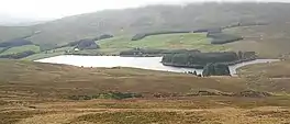 An upland lake surrounded by hills