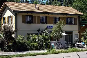 Two-story building with gabled roof