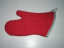 A red oven mitt.