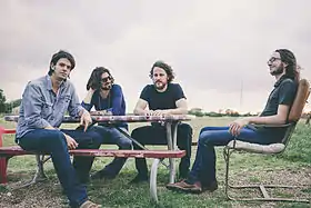 The Band of Heathens on a promotional photo for their 2013 album Sunday Morning Record.