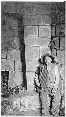 Martín Chambi (Peru) photo of a man at Machu Picchu, published in Inca Land. Explorations in the Highlands of Peru, 1922