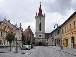 Míru Square with the Church of the Assumption of the Virgin Mary and the bell tower