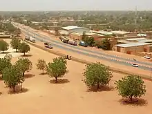 Truck and car traffic along Boulevard Mali Bero, Niamey, Niger