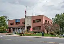 A two-story brick firehouse