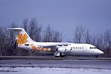 Holding for runway 25 sporting the new name for Air Canada Regional. Notice the location of the registration on the rear fuselage. On the other side it is under the wing. ex Air Nova