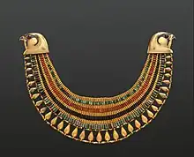 Broad collar of Senebtisi; 1850–1775 BC; faience, gold, carnelian and turquoise; outside diameter: 25 cm, maxim width: 7.5 cm; Metropolitan Museum of Art