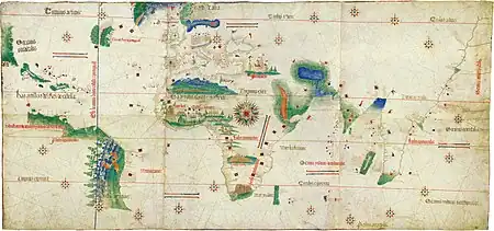 Photograph showing an old map which covers the area from the Atlantic coast of the South American continent eastwards around Africa to India and on to the Malay peninsula at the eastern edge of the map, with Europe in the far north.