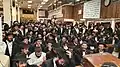 Chabad Hasidim in the main synagogue at 770