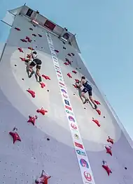 Two climbers compete against each other on the Speed Wall (Chamonix 2018)