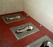 Traditional squat toilets in Beijing, China