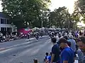 A pipe band partaking in the parade at the 2016 festival