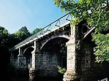 Disused railway bridge at the Crook o' Lune, once part of the "little" North Western Railway, now a cycle path