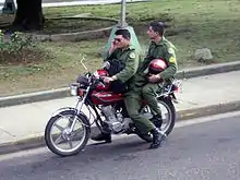 Cuban soldiers in olive drab.