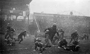 Image 19Tom Davies of Pittsburgh runs against undefeated and unscored upon Georgia Tech in the 1918 game at Forbes Field (from History of American football)