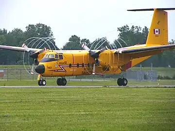 Vortices can be formed at the ends of propeller blades, as seen on this DHC-5 Buffalo.