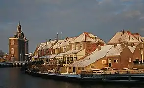 The 'kolk' behind 'Bocht/Zuiderspui' with Drommedaris in the snow.