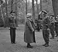 Queen Wilhelmina inspecting the honor guard directly in front of the villa upon her arrival there, 2 May 1945