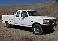 Ford F-250 extended cab fitted with an aftermarket utility bed