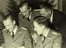 Christmas 1942 in Westerbork (from left to right) Albert Konrad Gemmeker [de], Hassel, Aus der Fünten and Scheltnes of Lippmann, Rosenthal & Co.