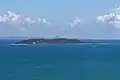 Isla Palomino seen from East, the coast of Fajardo in the background