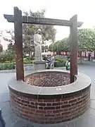 Water well where devotees throw letters in memory of St. Rose