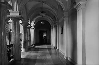 Second floor level of the staircase, with a plaque on the right observing the spot where Schauman shot Bobrikov