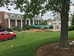 Flint Hill Lower School Campus (left) and the Miller House administration building (right)