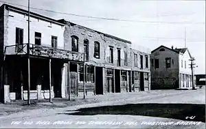 The Gird Block Building at left in 1880. Schiefflin Hall is to the right.