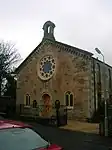 Glencairn Kirk in Kilmaurs with a cast-iron fence and gateposts.