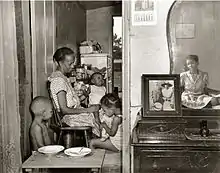 Ella Watson, with an adopted daughter and three of her grandchildren