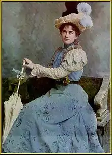 A handcolored portrait of a young white woman, seated, holding a closed parasol; she is wearing a large plumed hat and a blue gown with white lace sleeves