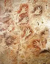 Image 8Hand stencils in the "Tree of Life" cave painting in Gua Tewet, Kalimantan, Indonesia (from History of painting)