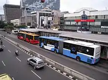 TransJakarta articulated bus fleets at Harmoni, 2016