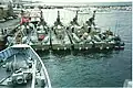 Five Hauk-class patrol boats at quay in 2001, viewed from HNoMS Horten. To right of the Hauk-class vessels is a CB90-class fast assault craft.