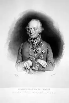 Black and white lithograph of a balding man with wispy gray hair. His arms are crossed and he wears a gray military uniform with several medals.