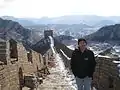 Usher visiting the Great Wall of China in November 2009, achieving the 64th goal on his list of 100