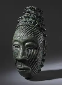 Igbo ukwu face pendant.png