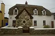 Thatched roof house in Kilmore Quay, Ireland