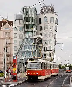 Prague Tatra T3R.P tram in front of the Dancing House